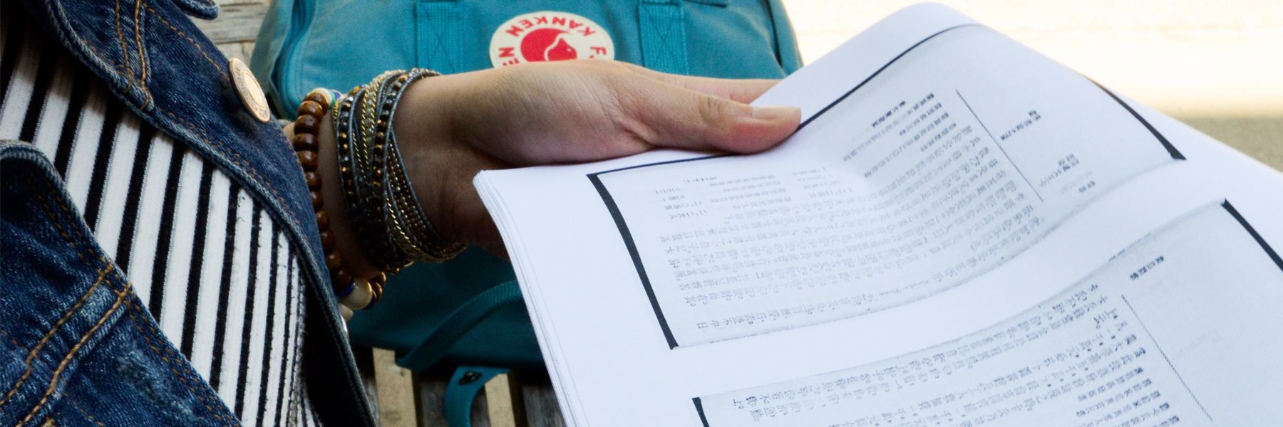 Linguistics student studying characters.